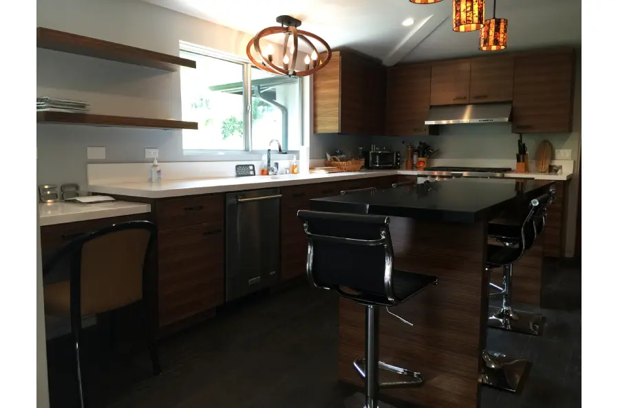 Modern interior of kitchen with hanging chandelier