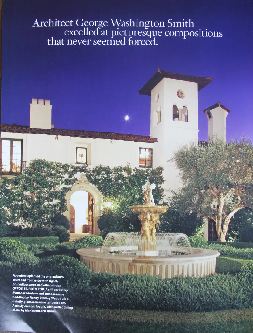 Historic stone villa with a central fountain under a twilight sky.